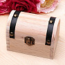 A wooden chest with a mix of stones