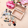 A wooden chest with a mix of stones