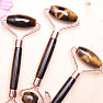 Tiger eye massage roller rose gold color