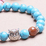 Howlit blue beaded bracelet with an owl