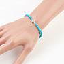 Turquoise bracelet with a zircon cross