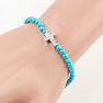 Turquoise bracelet with a zircon cross