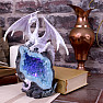 Statuette of a glowing ice dragon guardian