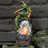 Statuette of a shining emerald dragon guardian