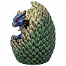 Statuette of a blue dragon in an egg