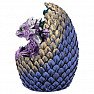 Statuette of a purple dragon in an egg