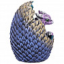 Statuette of a purple dragon in an egg