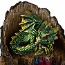 Statuette glowing Green dragon on a tree stump