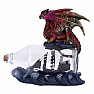 Statue of a dragon with a ship in a bottle Voyage