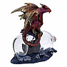 Statue of a dragon with a ship in a bottle Voyage