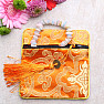 Brocade bag orange with zipper and coins for luck 12x12 cm