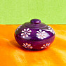 Stand Purple bowl with flowers on incense sticks