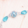 Prosperity and blessings of Feng Shui string into the window of cut turquoise crystals